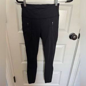 Lululemon Black Leggings with mesh bottom and zipper pockets